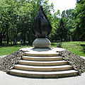 The "Flame", monument of the Hungarian Revolution of 1956, bronze sculpture on a pile of basalt cobblestones - Будапешт, Угорщина