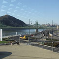 Looking through the glass wall of the Bálna at the Danube bank of Ferencváris district, the Szabadság Bridge (or Liberty Bridge) and the Gellért Hill - Budapest, Ungarn